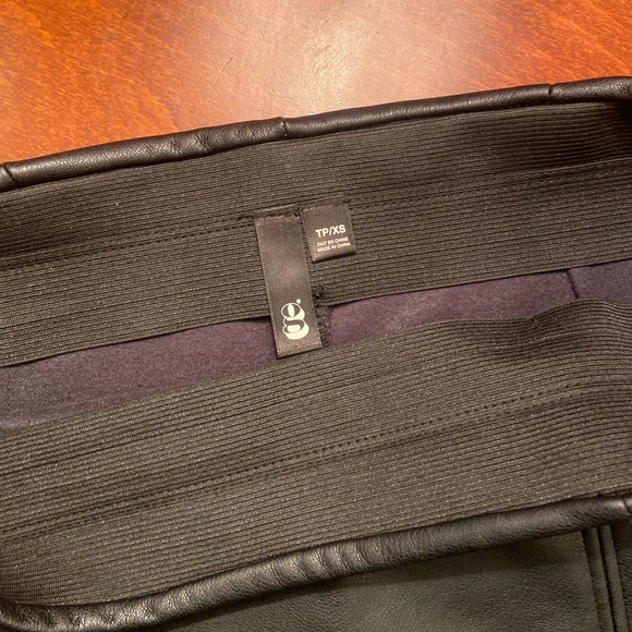 Mini Black Faux Leather Garage Skirt With Slit in XS - Picture 3 of 5